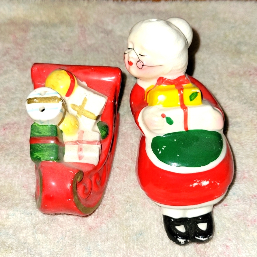 Antique Mrs. Clause And sleigh salt and pepper shakers